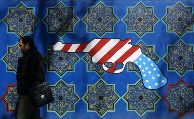 among the images being erased at the former us embassy in iran 039 s capital was an iconic revolver in stars and stripes photo afp