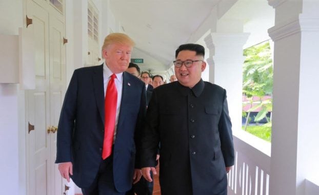 us president donald trump walks with north korean leader kim jong photo reuters