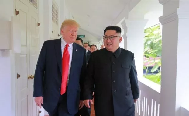us president donald trump walks with north korean leader kim jong photo reuters us president donald trump walks with north korean leader kim jong photo reuters