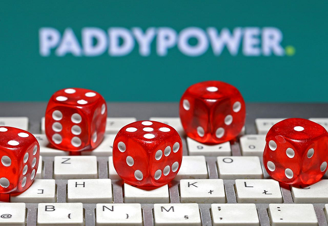 paddy power logo is seen behind a keyboard and gambling dice in this illustration taken in sarajevo september 10 2015 photo reuters paddy power logo is seen behind a keyboard and gambling dice in this illustration taken in sarajevo september 10 2015 photo reuters