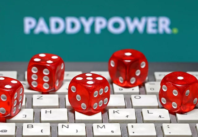 paddy power logo is seen behind a keyboard and gambling dice in this illustration taken in sarajevo september 10 2015 photo reuters