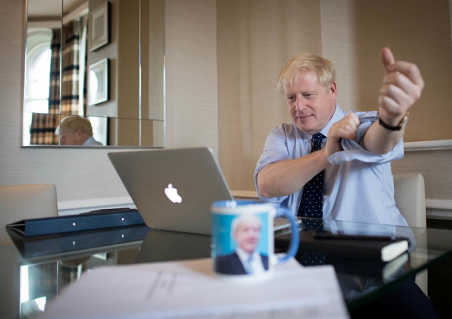 british prime minister boris johnson prepares his keynote speech which he will deliver to the conservative party conference tomorrow in manchester britain photo reuters