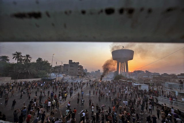 iraqi protesters gather during a demonstration against state corruption failing public services and unemployment at tayaran square in baghdad photo afp iraqi protesters gather during a demonstration against state corruption failing public services and unemployment at tayaran square in baghdad photo afp