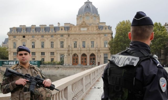 officers secure the area in front of paris police headquarters on thursday photo reuters officers secure the area in front of paris police headquarters on thursday photo reuters