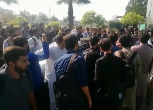 a large number of students boycott classes to stage protest and chant slogans against the university administration screen grab