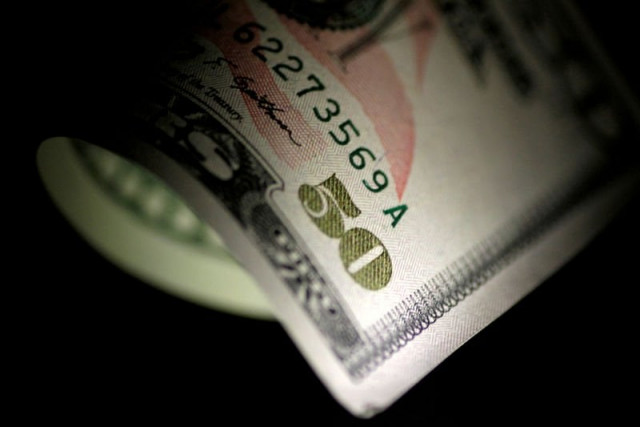 a us dollar note is seen in this reuters illustration photo a us dollar note is seen in this reuters illustration photo