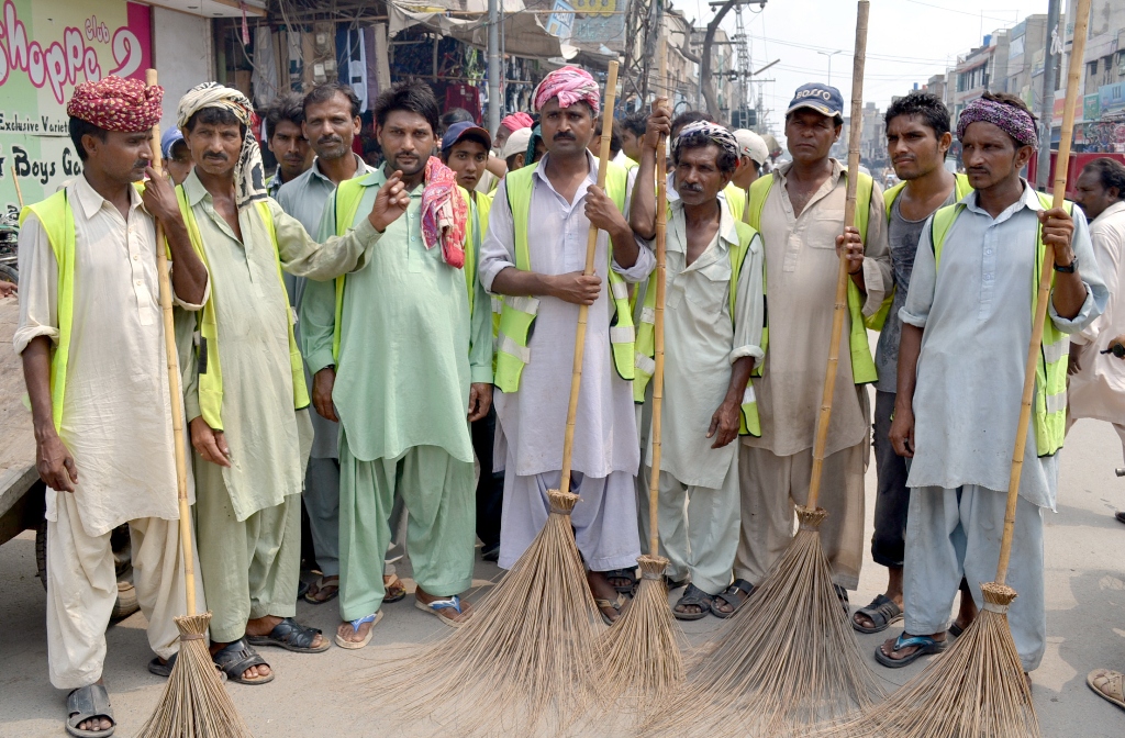 a photo of sanitary workers photo shahid bukhari