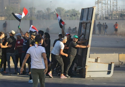 death toll nears 100 as deadly iraq protests spike death toll nears 100 as deadly iraq protests spike