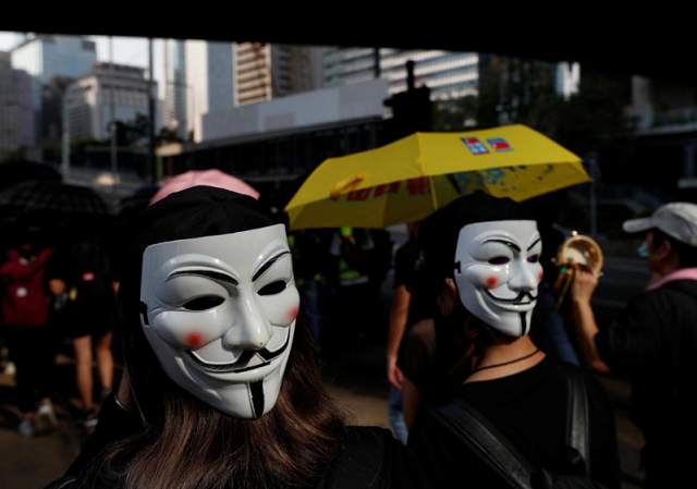 anti government protesters wearing masks attend a protest in central hong kong china october 5 photo reuters