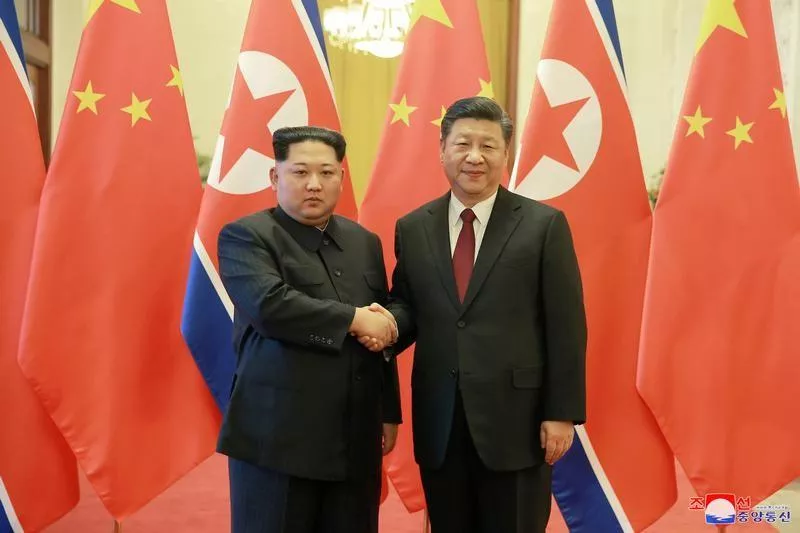 north korean leader kim jong un shakes hands with chinese president xi jinping in beijing photo reuters north korean leader kim jong un shakes hands with chinese president xi jinping in beijing photo reuters