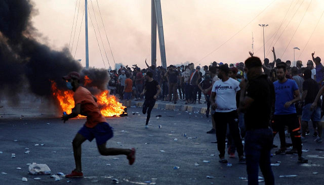 demonstrators gather during a protest after the lifting of the curfew following four days of nationwide anti government protests that turned violent in baghdad iraq october 5 2019 photo reuters demonstrators gather during a protest after the lifting of the curfew following four days of nationwide anti government protests that turned violent in baghdad iraq october 5 2019 photo reuters