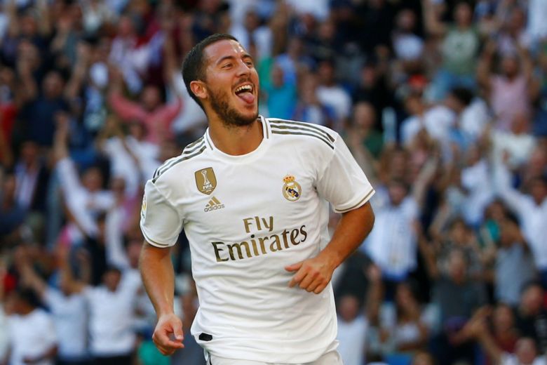 eden hazard ended the wait for his first real madrid goal but his team had to resist a spirited second half comeback from granada to seal a thrilling 4 2 victory in la liga on saturday photo afp