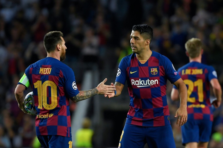 together the pair scored 76 goals for barcelona last season photo afp