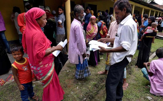 villagers wait outside the national register of citizens nrc centre to get their documents verified by government officials at mayong village in morigaon district in the northeastern state of assam india jul 8 2018 photo reuters