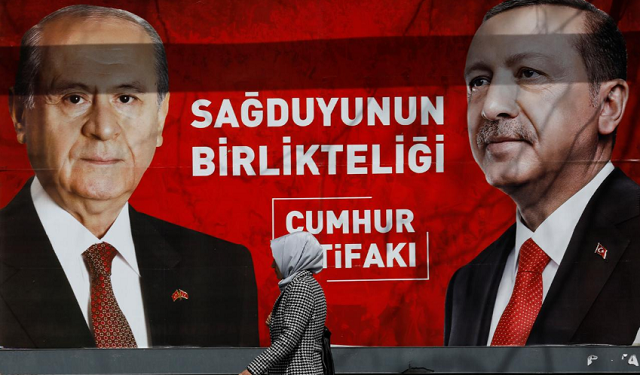 a woman walks past a banner for the upcoming local elections in ankara turkey march 27 2019 banner with pictures of turkish president tayyip erdogan and devlet bahceli leader of nationalist movement party mhp reads quot people 039 s alliance the unity of common sense quot photo reuters a woman walks past a banner for the upcoming local elections in ankara turkey march 27 2019 banner with pictures of turkish president tayyip erdogan and devlet bahceli leader of nationalist movement party mhp reads quot people 039 s alliance the unity of common sense quot photo reuters