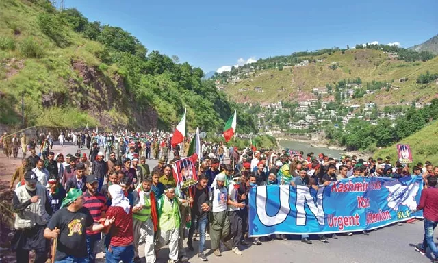 chanting anti indian slogans the protest heads towards chakothi village on saturday photo afp chanting anti indian slogans the protest heads towards chakothi village on saturday photo afp