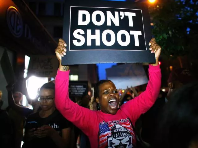 a file photo of a woman holding a banner during a protest in support of the black lives matter movement in new york photo afp a file photo of a woman holding a banner during a protest in support of the black lives matter movement in new york photo afp