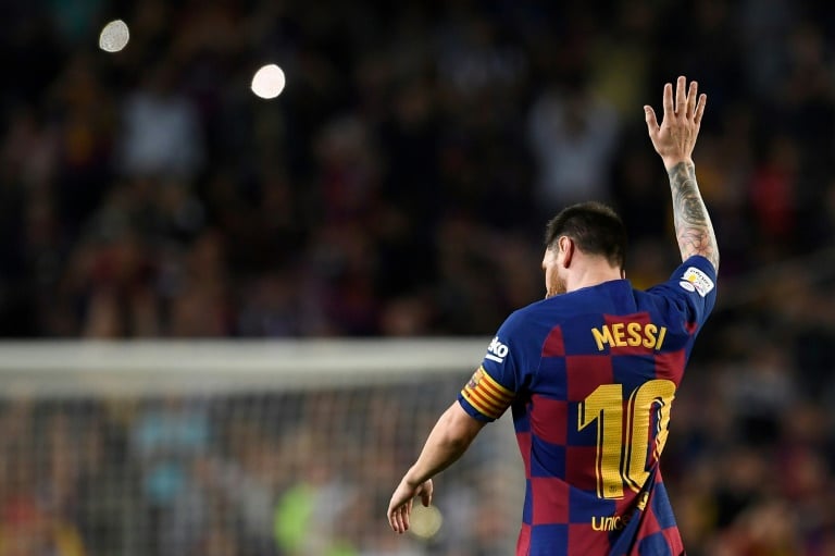 lionel messi scored his first goal of the season by curling in a brilliant free kick at camp nou photo afp