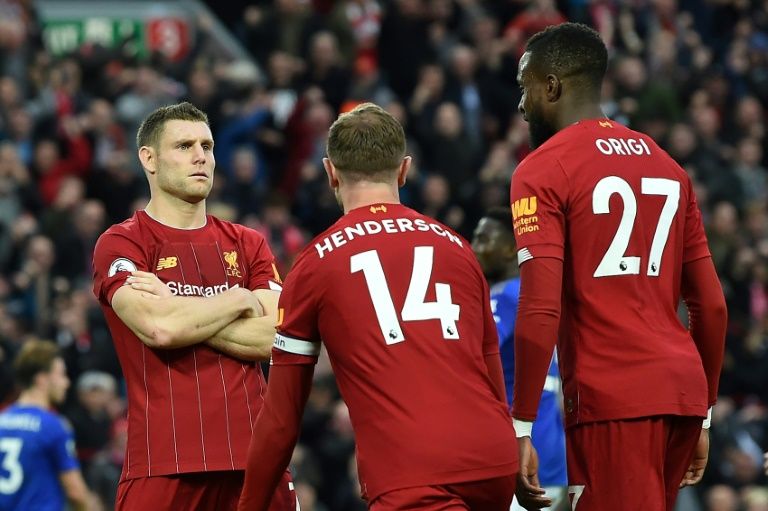 liverpool opened up an eight point lead over manchester city as the leaders clinched a dramatic win over leicester photo afp