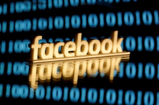 a 3 d printed facebook logo is seen in front of displayed binary code in this illustration picture june 18 2019 photo reuters a 3 d printed facebook logo is seen in front of displayed binary code in this illustration picture june 18 2019 photo reuters
