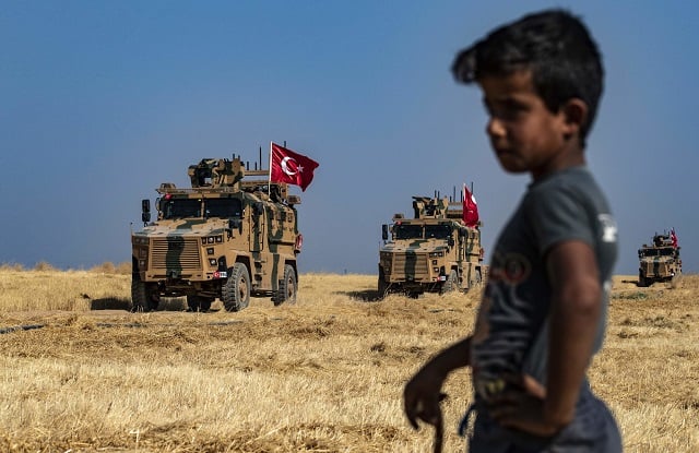 turkish military vehicles patrolling in northeastern syria this month as part of joint patrols with the united states photo afp file