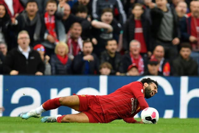 egyptian hobbled off in added time during the 2 1 win over the foxes after being caught from hamza choudhury photo afp egyptian hobbled off in added time during the 2 1 win over the foxes after being caught from hamza choudhury photo afp
