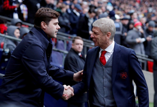 wenger says pochettino is almost paying for his own success and that the team is lacking the chemistry of previous seasons photo afp