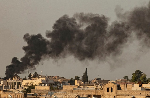 smoke billows following turkish bombardment on syria 039 s northeastern town of ras al ain in the hasakeh province along the turkish border on october 9 2019 photo afp