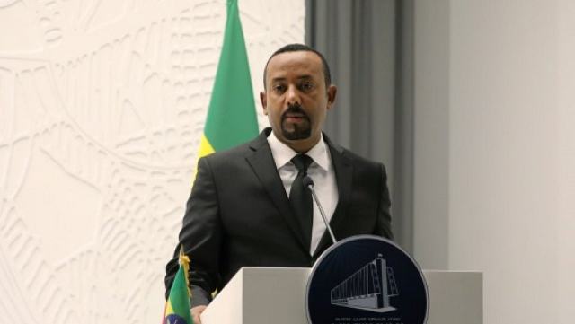 ethiopian prime minister abiy ahmed delivers a speech during a meeting with french president emmanuel macron on march 12 2019 in addis ababa photo afp