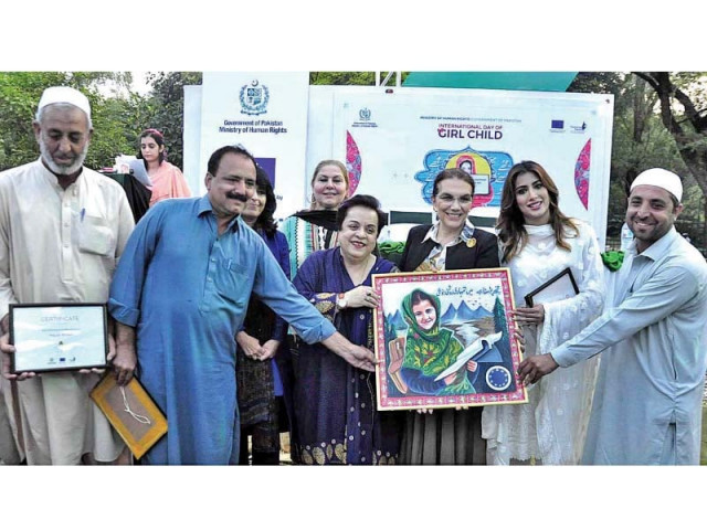 eu ambassador androulla kaminara being presented a painting by truck artists at lok virsa photo app eu ambassador androulla kaminara being presented a painting by truck artists at lok virsa photo app