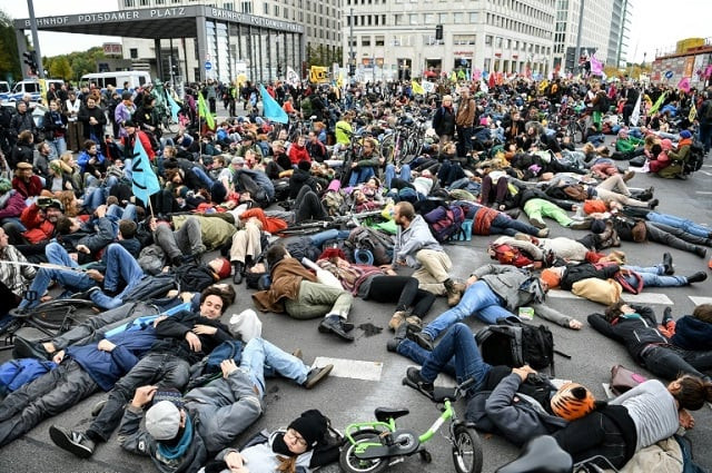 activists from the quot extinction rebellion quot members demonstrate at potsdamer platz square in berlin photo afp