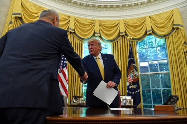 vice premier of the people 039 s republic of china liu he shakes hands with us president donald trump photo afp