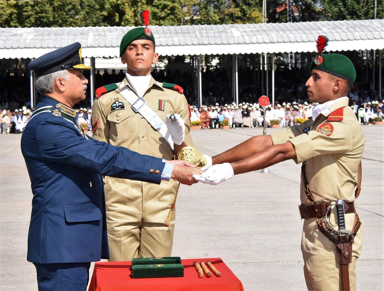 the coveted sword of honour is being awarded to battalion senior under officer usman shahid photo ispr