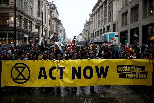 climate change activists attend an extinction rebellion demonstration in london britain october 12 photo reuters climate change activists attend an extinction rebellion demonstration in london britain october 12 photo reuters
