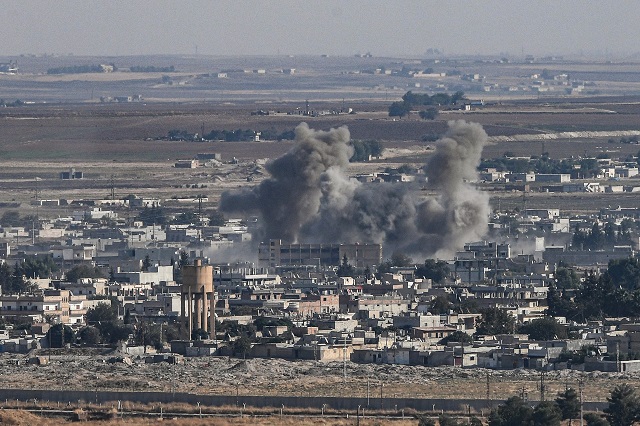 turkish city of ceylanpinar shows smoke rising from the syrian border town of ras al ain as fighting rages along the border on the fifth day of a turkish offensive in syria against the kurdish people 039 s protection units ypg that has provoked an international outcry and left dozens of civilians and fighters dead photo afp