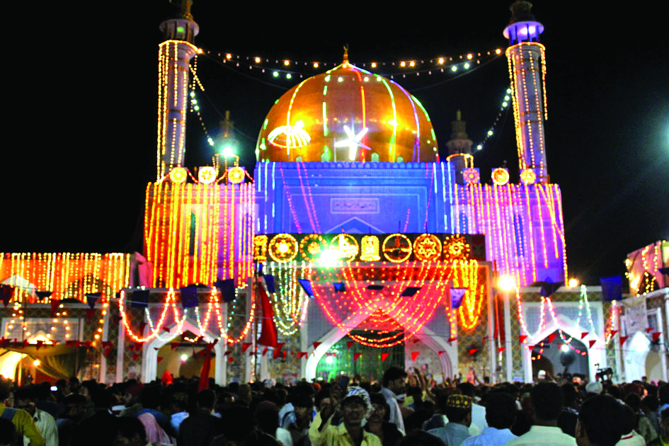 thousands of devotees gather at 13th century sufi saint lal shahbaz qalandar s shrine in sehwan each year photo file