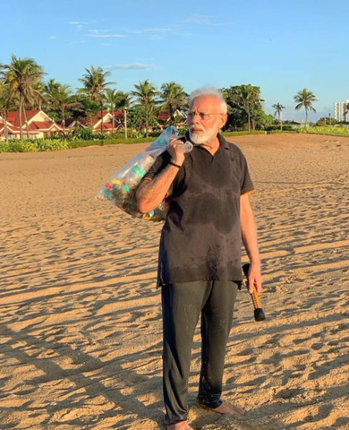 twitter hits gold as video of pm modi picking up trash goes viral twitter hits gold as video of pm modi picking up trash goes viral