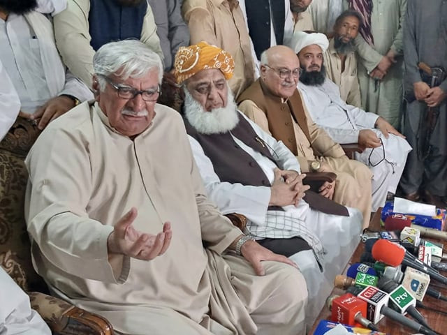 anp chief asfandyar wali and jui f chief maulana fazlur rehman address a joint news conference in peshawar on monday photo express anp chief asfandyar wali and jui f chief maulana fazlur rehman address a joint news conference in peshawar on monday photo express