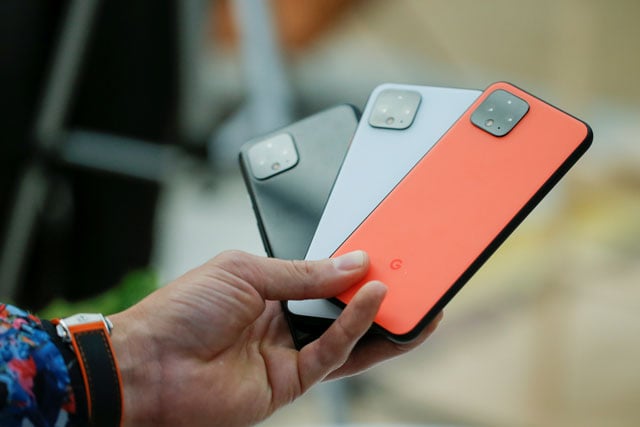 a man holds new google pixel 4 smartphones as they are displayed during a google launch event new york city new york us october 15 2019 photo reuters