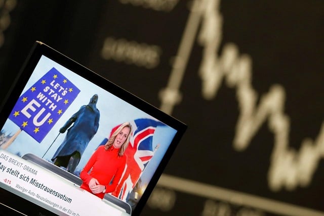 a tv screen is seen next to the german share prize index dax board the day after the brexit deal vote of the british parliament during trading at the stock exchange in frankfurt germany photo reuters file