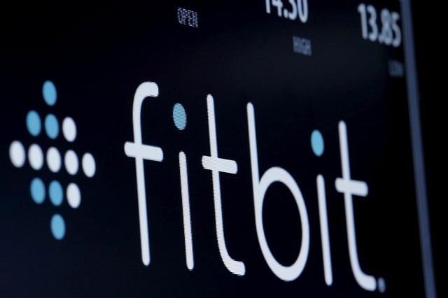 the ticker symbol for fitbit is displayed at the post where it is traded on the floor of the new york stock exchange february 23 2016 photo reuters