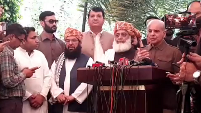 pml n president shehbaz sharif r and jui f chief maulana fazur rehman l address joint presser in lahore screengrab