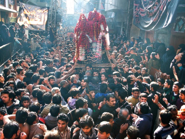 file photo of mourners carrying the taziya on hazrat imam hussain 039 s ra chehlum photo abid nawaz express