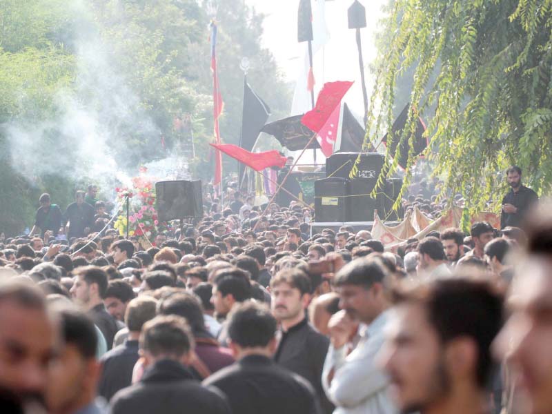 a large number of mourners attend a procession to mark chehlum of imam hussain a s at the sector g 6 imambargah in the capital photo online