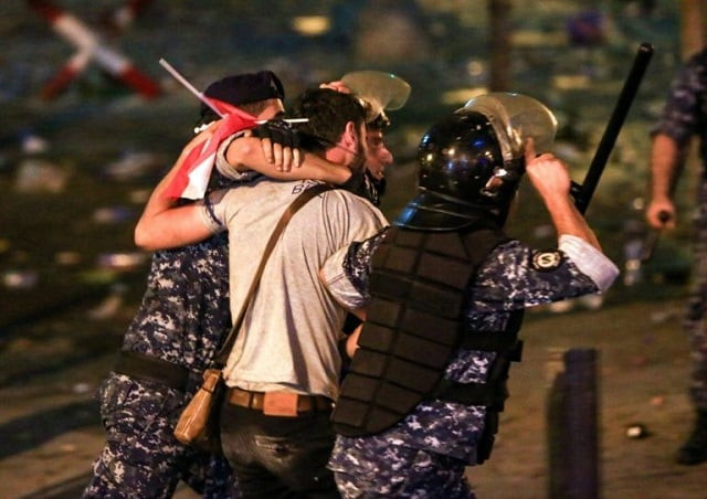 lebanese security forces say they made 70 arrests dispersing the thousands of protesters who gathered in beirut 039 s riyadh al solh square in the largest demonstrations in years photo afp