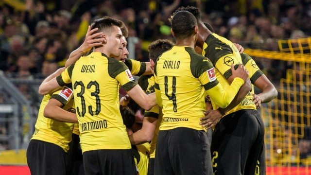 borussia dortmund beat top of the table borussia moenchengladbach 1 0 to jump to fourth in the bundesliga on saturday photo afp borussia dortmund beat top of the table borussia moenchengladbach 1 0 to jump to fourth in the bundesliga on saturday photo afp