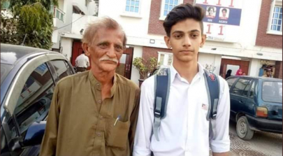 newspaper hawker s son defies odds to top karachi s intermediate exam