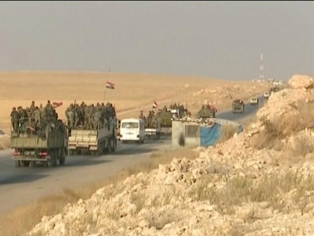 vehicles travel along a road in raqqa syria october 20 2019 in this still image taken from video video taken october 20 2019 photo reuters