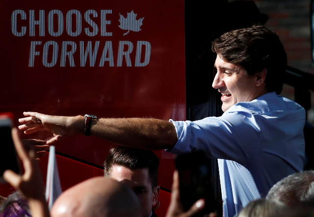 trudeau s liberals win canada vote will form minority govt