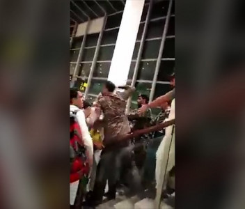 asf official spits at thrashes passengers at islamabad airport asf official spits at thrashes passengers at islamabad airport